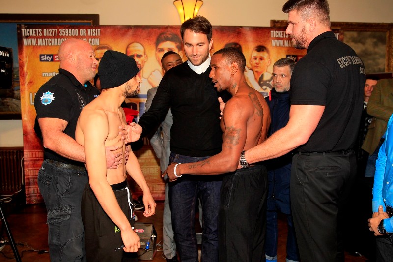 FIGHTING PRIDE WEIGH IN CITY HALL,HULL PIC;LAWRENCE LUSTIG BRITISH LIGHT-WELTERWEIGHT TITLE CHALLENGER CURTIS WOODHOUSE COMES FACE TO FACE WITH CHAMPION DARREN HAMILTON AT A HIGHLY CHARGED WEIGH IN