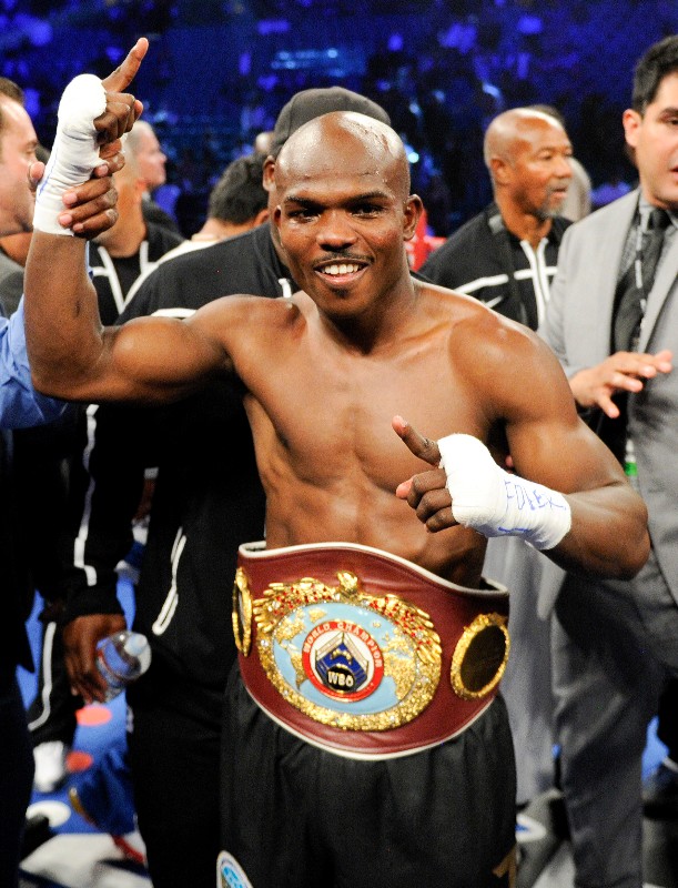 Timothy Bradley poses with his champion's belt following WBO welterweight title fight split decision victory over Manny Pacquiao, from the Philippines, Saturday, June 9, 2012, in Las Vegas. (AP Photo/Chris Carlson)